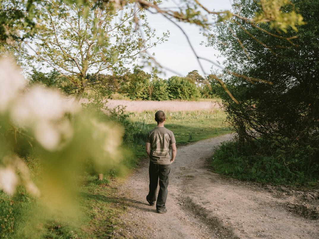 person reflecting alone in nature