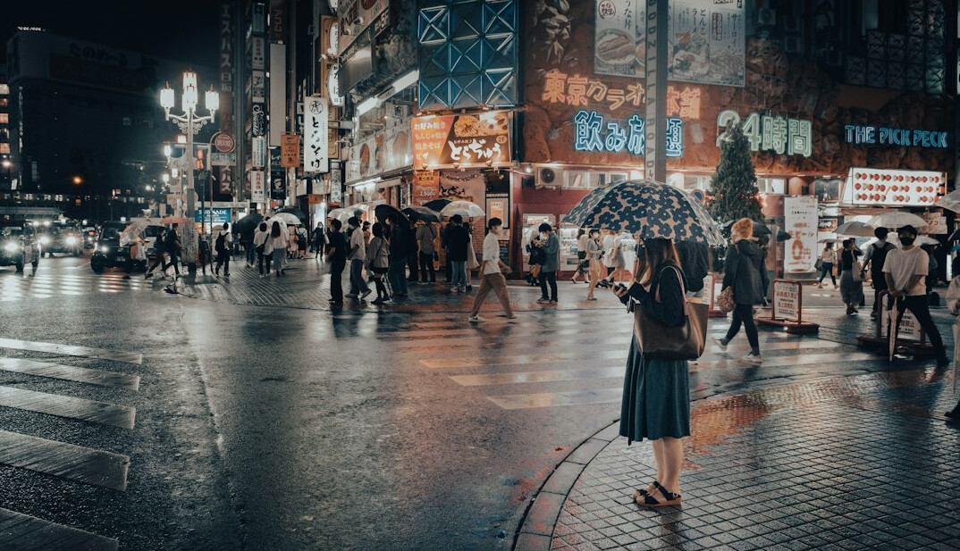 person feeling alone in busy city