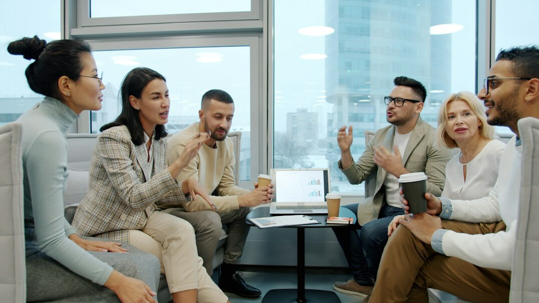 diverse people in discussion circle